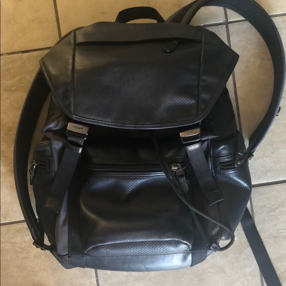 I am selling this Navy Blue men’s Coach backpack.